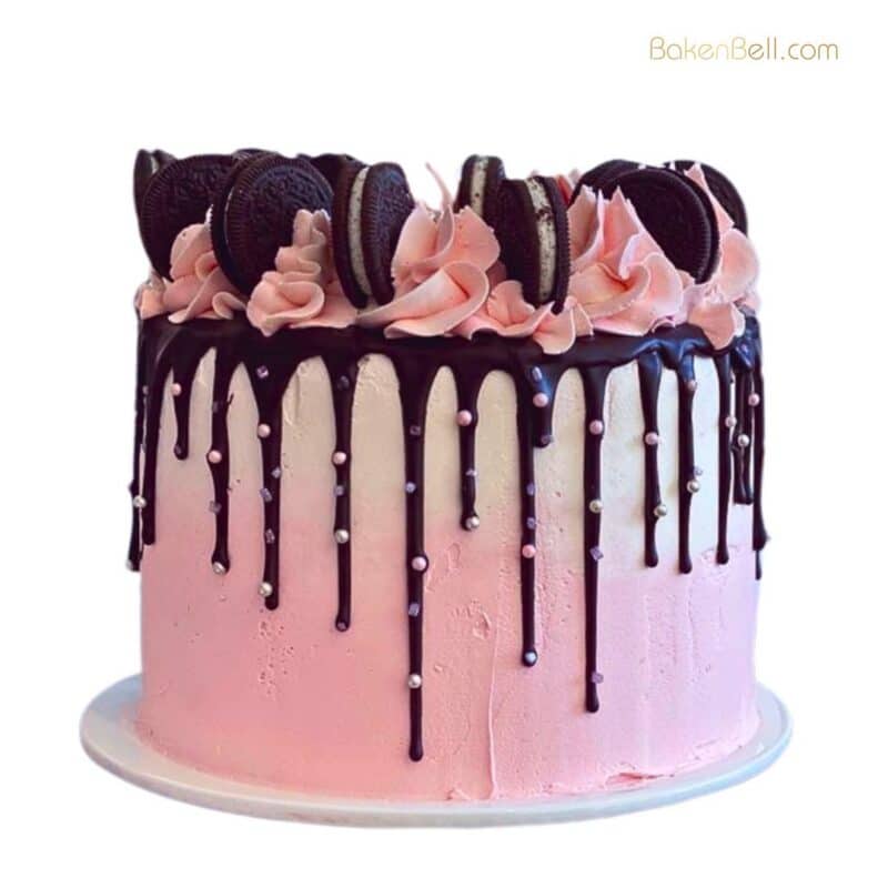 Strawberry chocolate drip cake with oreo biscuits